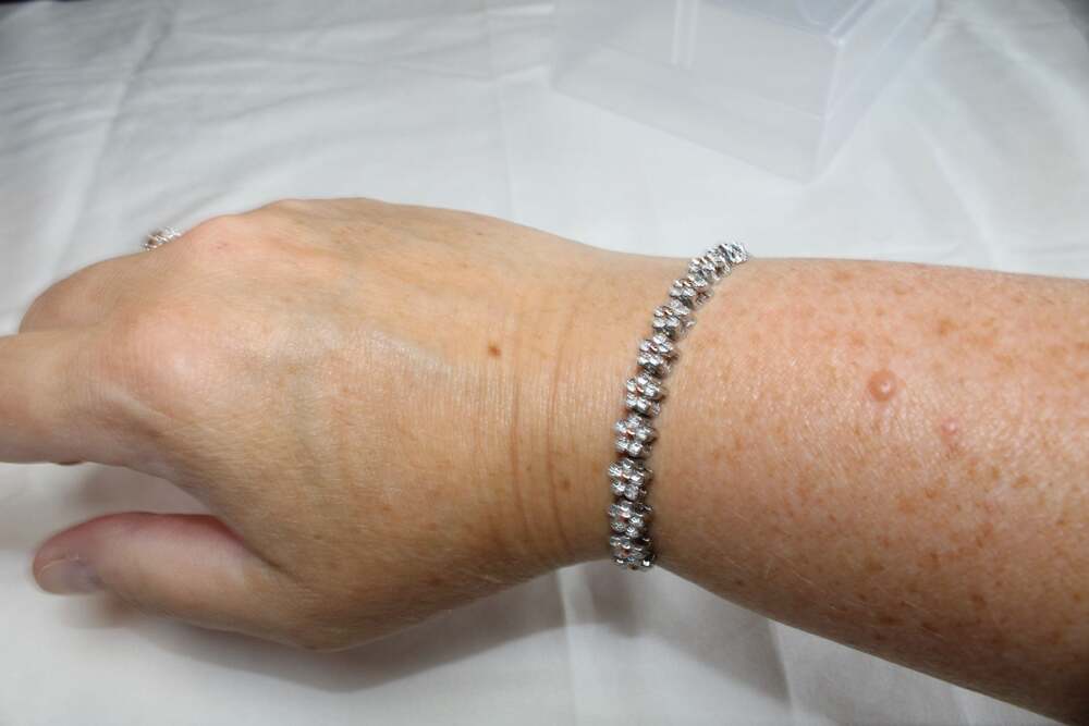 Cubic Zirconia Floral Link Adjustable Bolo Bracelet